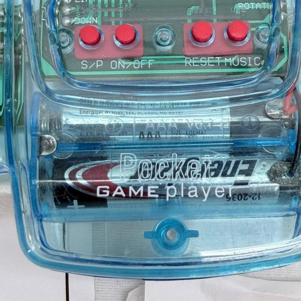 Aspen Direct Pocket Game Player Handheld 11-in-1 LCD Game Blue Translucent Retro